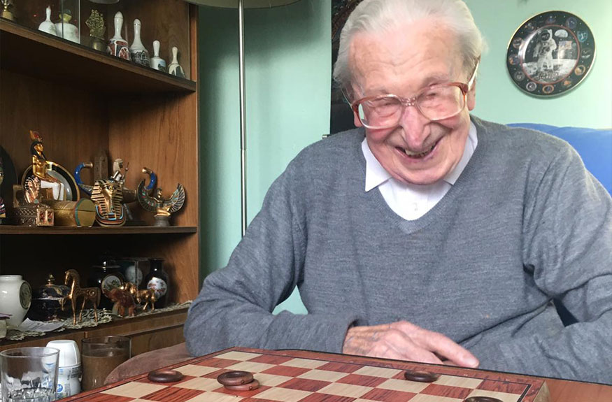 Man playing draughts